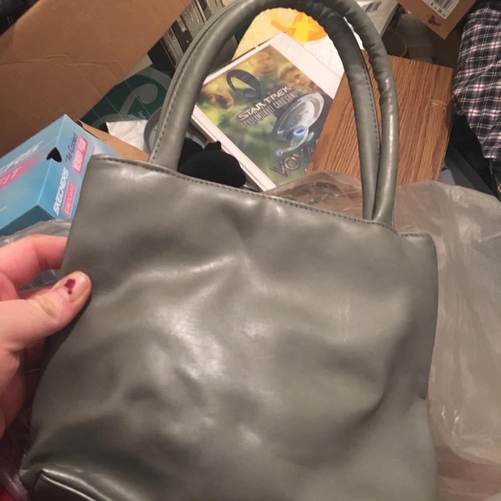 Lot of four purses. Never used.